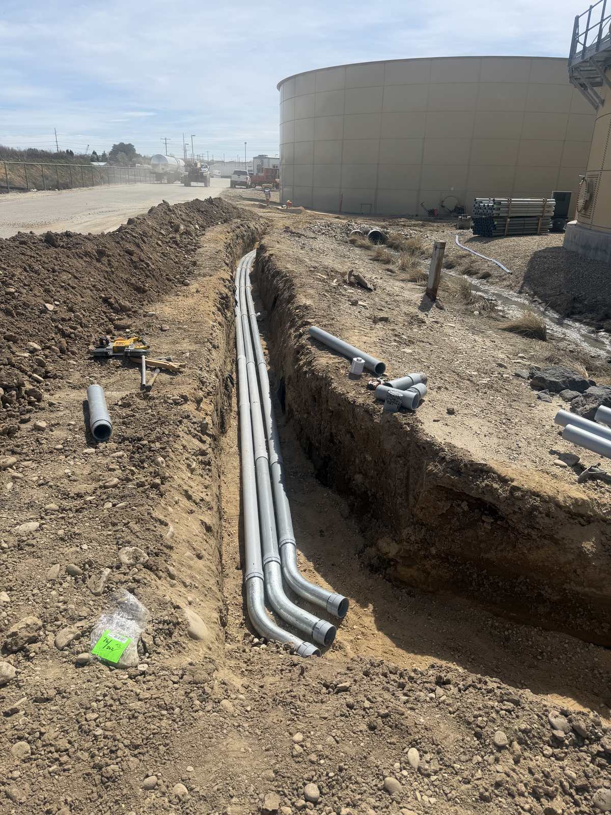 Underground conduit in trench for industrial feeders